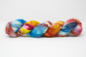 multicolored yarn. Orange, blue, red, and yellow. Lace weight yarn.