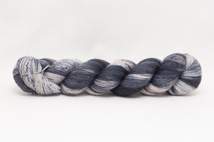 multicolored yarn, black yarn, grey yarn